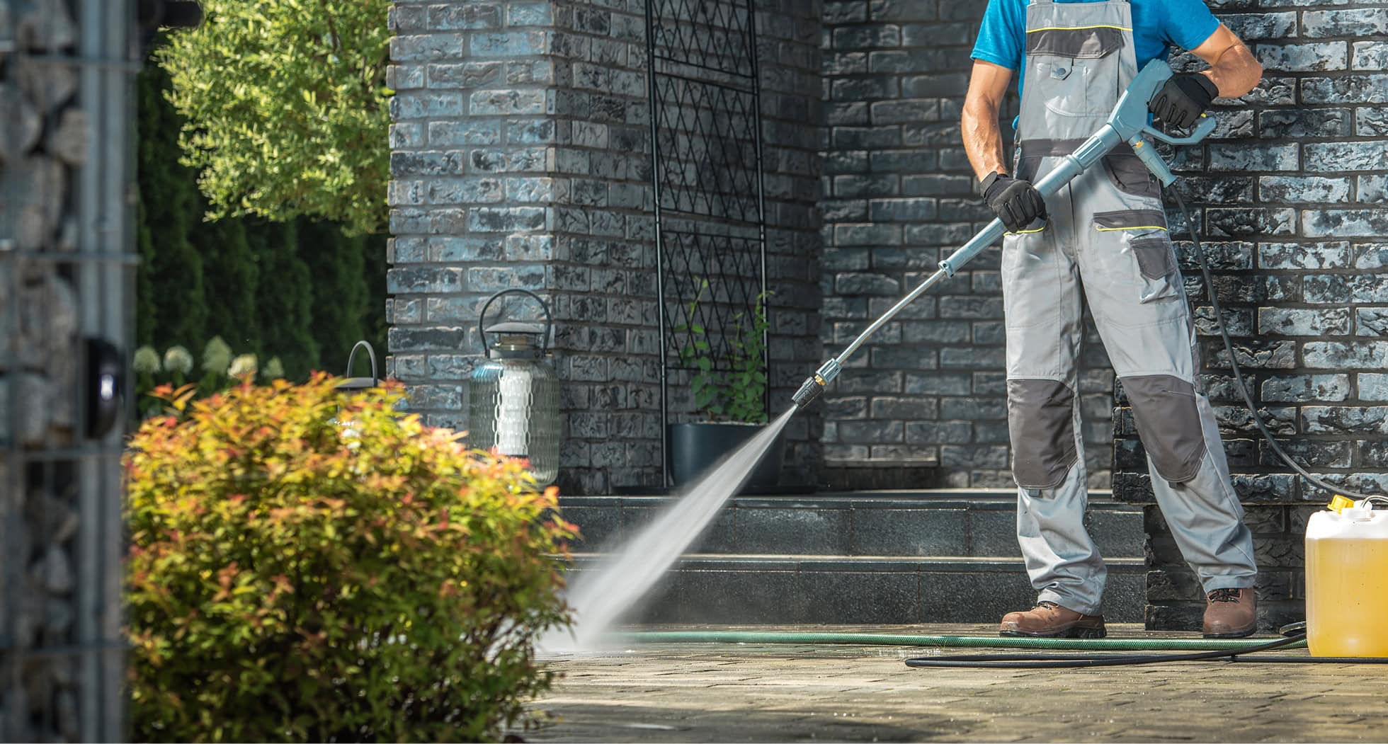Pressure washing a driveway clean